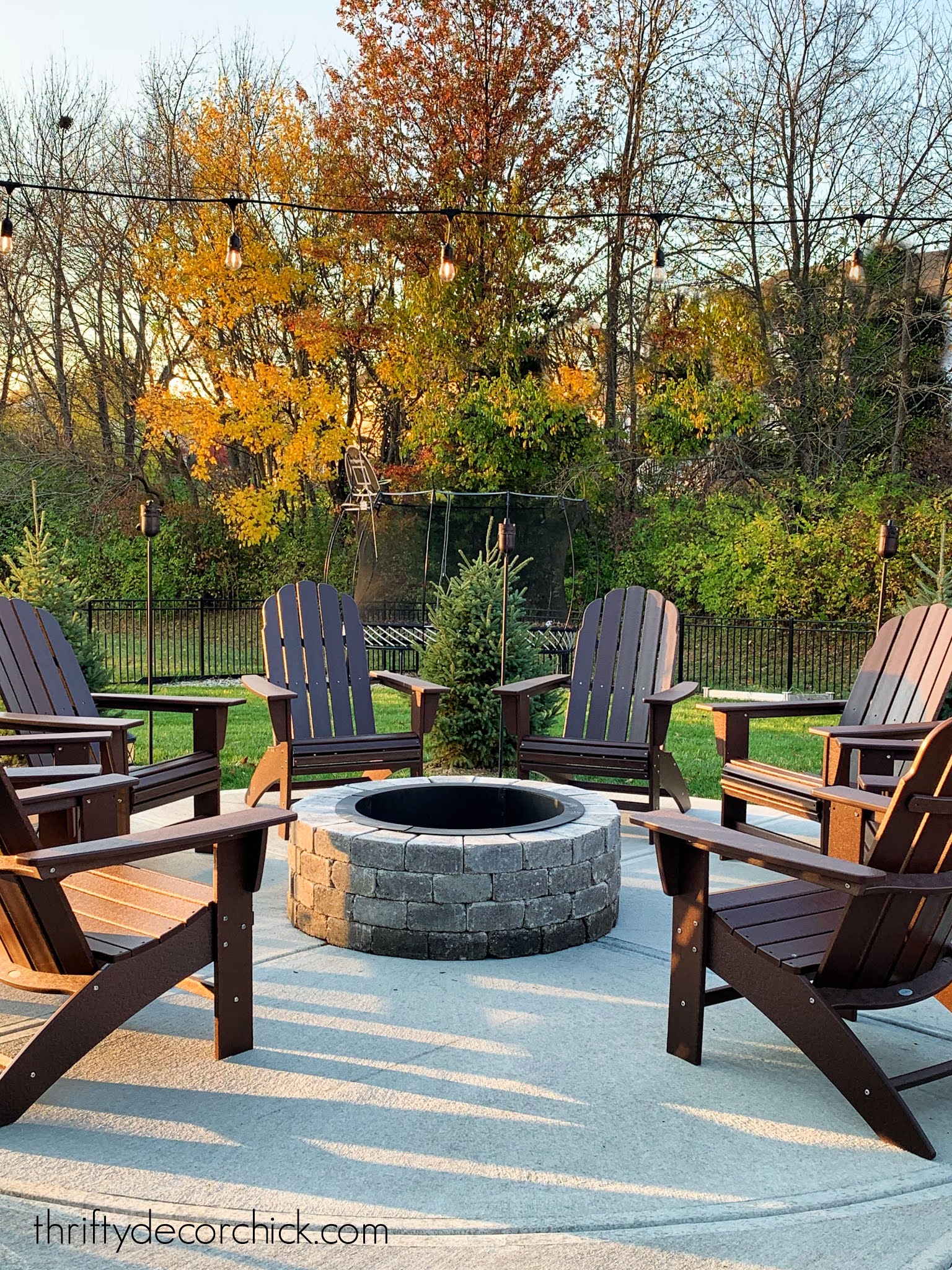 Our Cozy Round Patio Fire Pit With New, Adirondack Chairs Around Fire Pit
