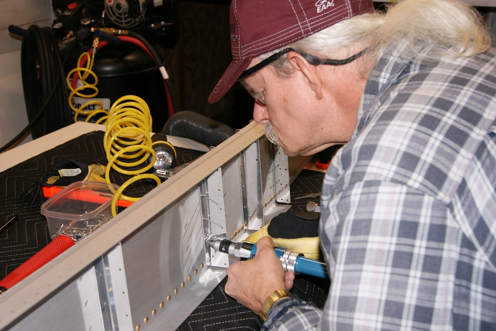 DOG Aviation John's RV-12 Blog: Riveting Rib Attach Clips Onto Left Spar