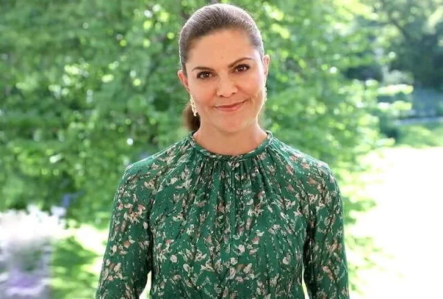 Crown Princess Victoria wore a floral dress by H&M Conscious Exclusive Collection, and rose gold poppy diamonds earrings by Kreuger