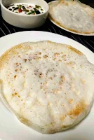 Serving appam with vegetable stew