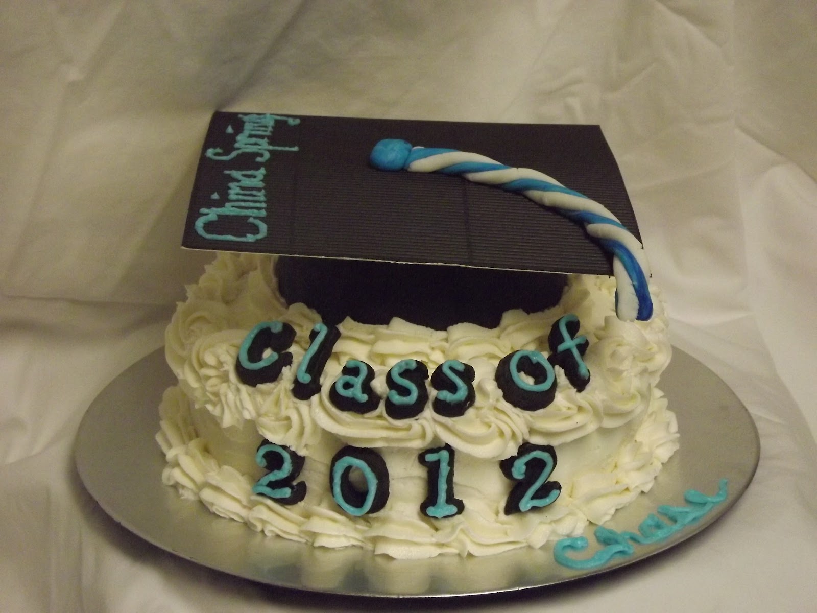 For Goodness Cake!! graduation cake with fondant letters and grad cap