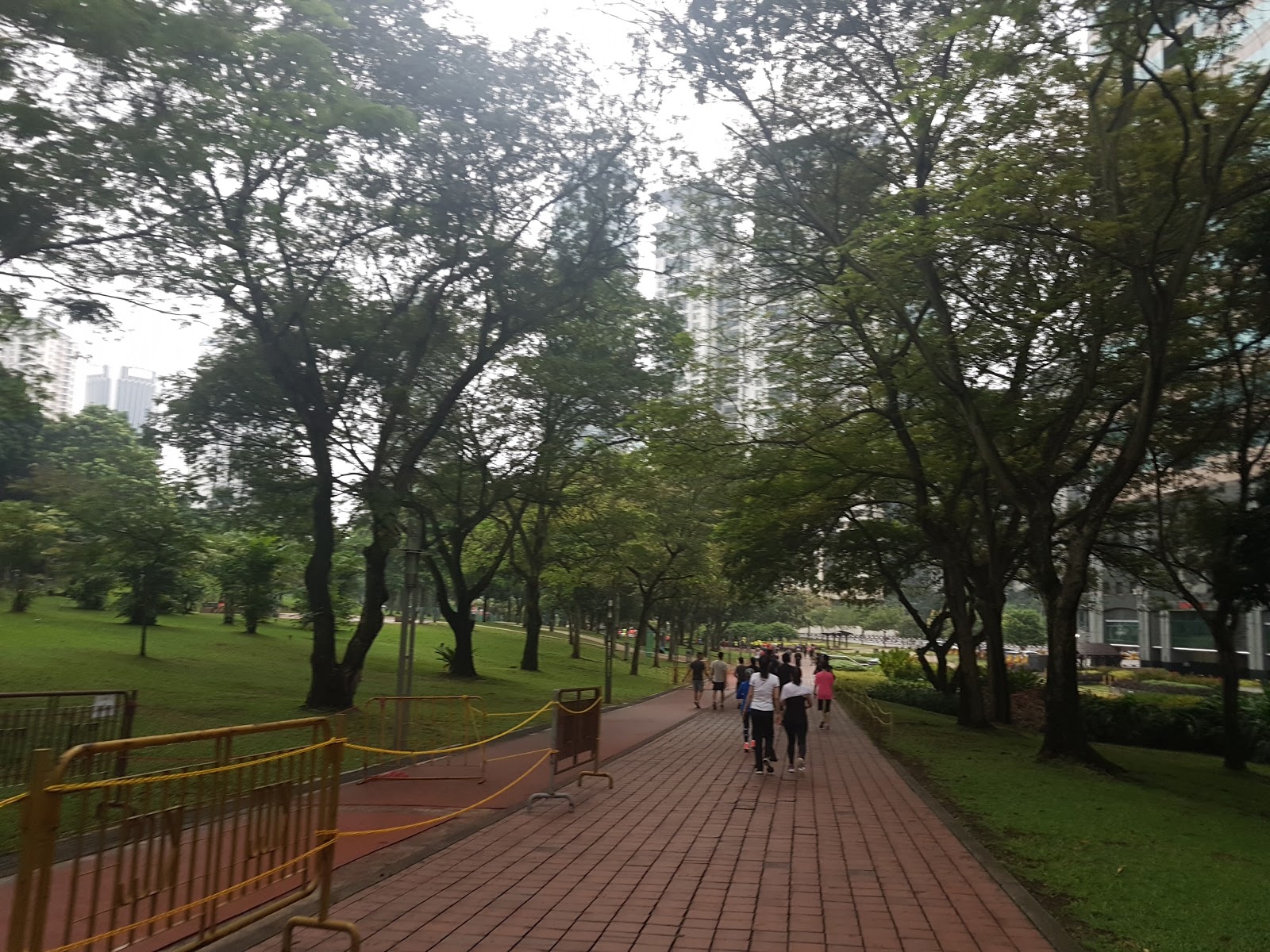 Running at KLCC Park next to Petronas Twin Tower and KLCC Suria ...