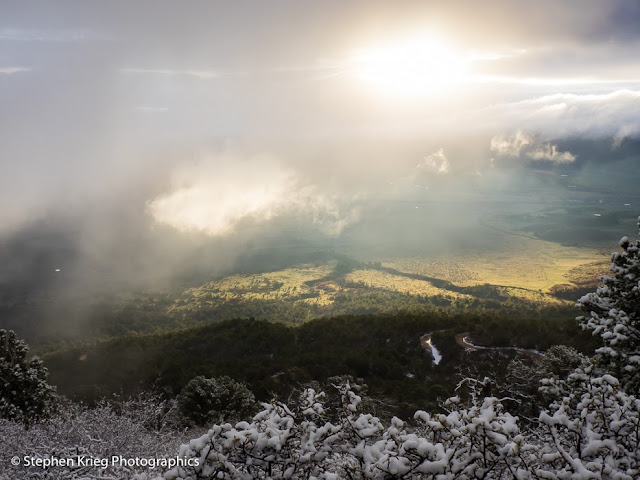 Clearing fog at sunrise, Mancos Valley Overlook, Mesa Verde National Park, Colorado.