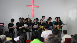 Kids singing at church.