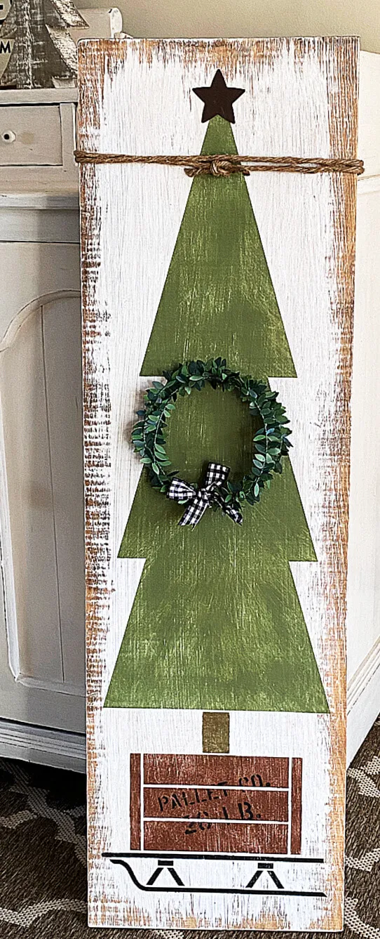 stenciled Christmas tree with a wreath