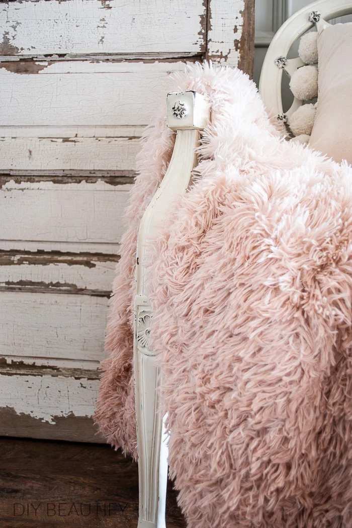 chippy door and fluffy pink throw