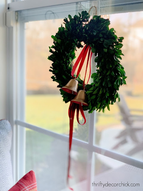 mini boxwood wreath with ribbon and bells