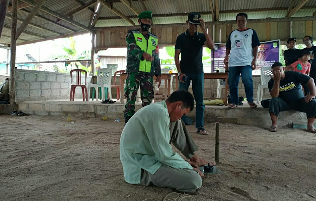 Babinsa Agung Sucianto Melakukan Monitor dan Pengamanan Pada Lomba Gasing