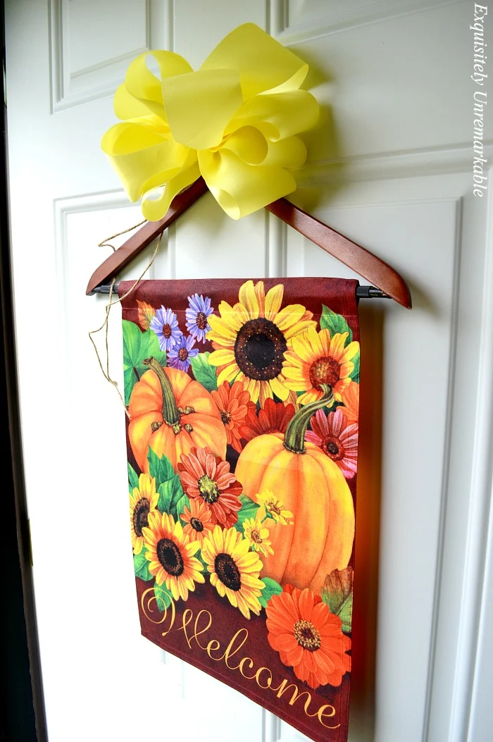 Pumpkin and Flowers Welcome Flag On Front Door With Yellow Bow