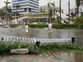 people walking on Yingbin South Road in Zhuhai after Typhoon Hato