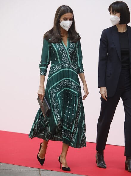 Queen Letizia wore a scarf print wrap long sleeve midi dress from Sandro. Minister Diana Morant and Director Ana Botin