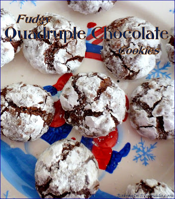 Fudgy Quadruple Chocolate Cookies are made with four different chocolates, rolled in confectioner’s sugar and baked to fudgy perfection. | Recipe developed by www.BakingInATornado.com | #recipe #cookies