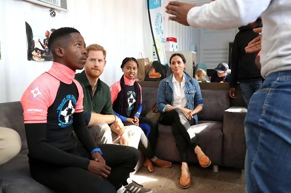 Meghan Markle wore Jennifer Meyer diamond bezel and turquoise marquise stud earrings and Madewell jacket