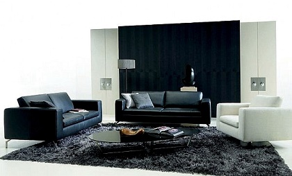 Salas con sofá color negro de cuero - Decoración de salas con estilo