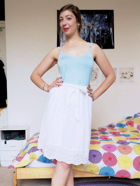 Cinderella Disneybound outfit of pale blue top, floaty white skirt & nude flat shoes