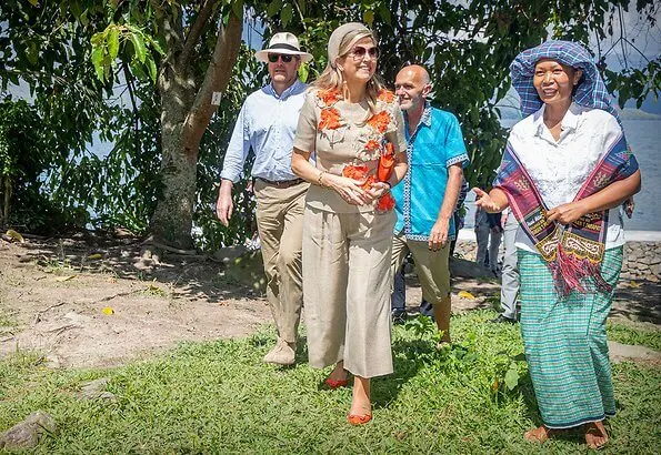 Queen Maxima wore a top and trousers by Natan