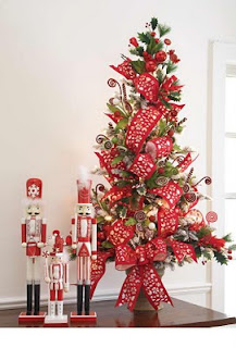 table top flat Christmas tree decorated with red bows