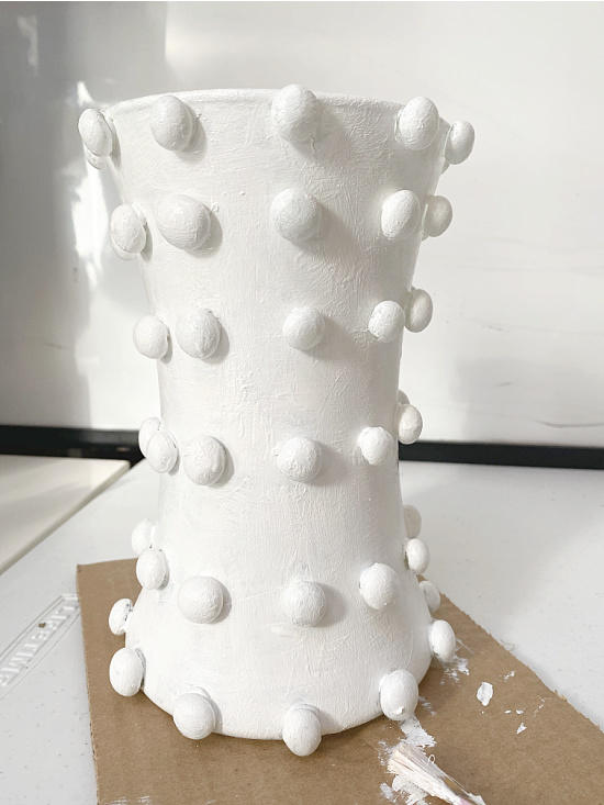 white painted hobnail looking vase