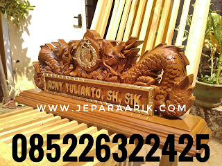 papan nama motif naga