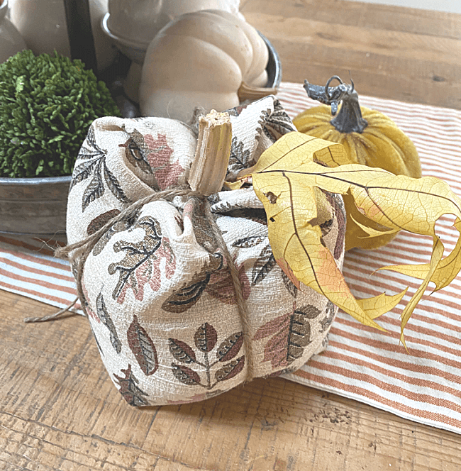 Vintage fabric pumpkin with yellow leaf