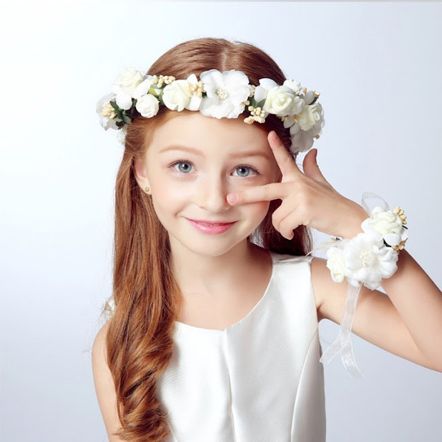 little girl hairstyle with flower for weddings
