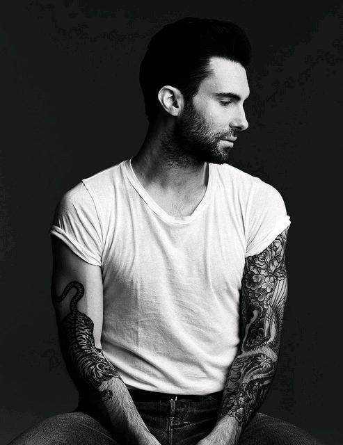 Adam Levine when appearing and showed cool tattoos on his hand