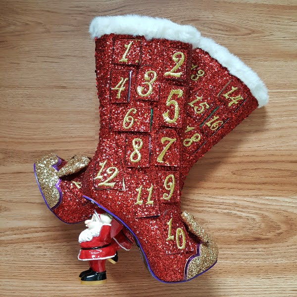 red sparkly advent calendar boots flatlay