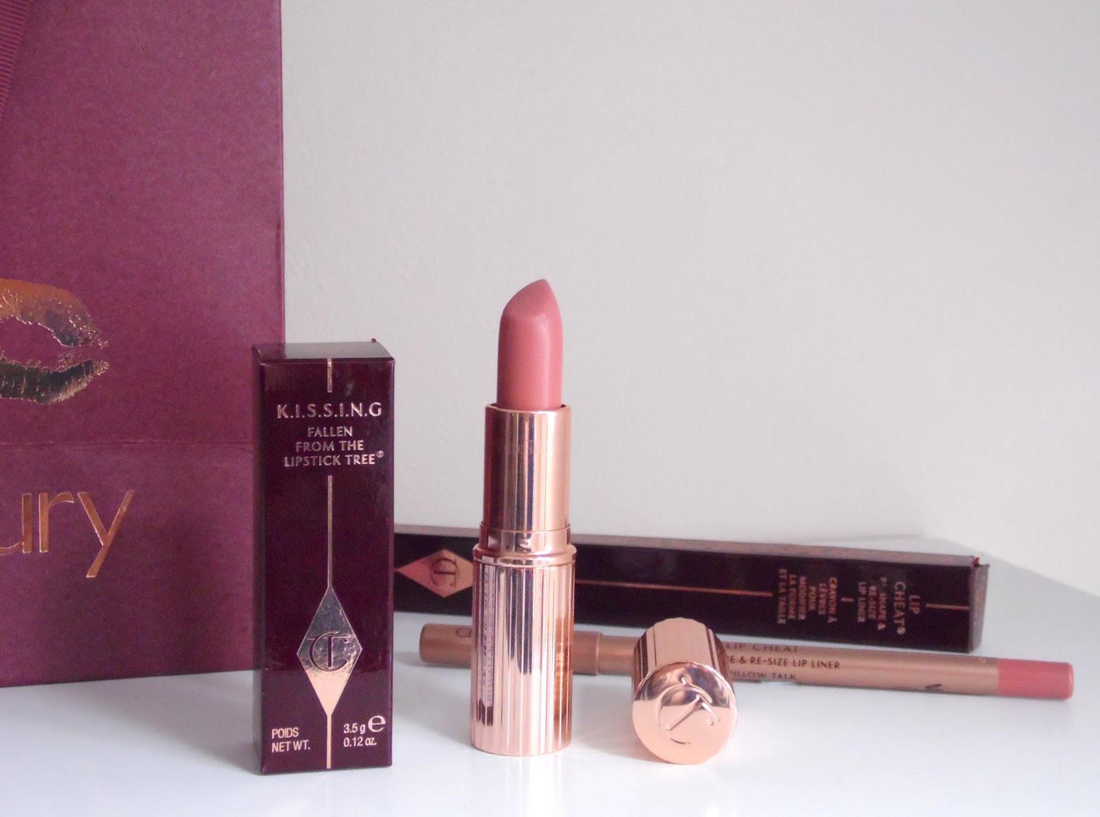 Charlotte tilbury lipstick in gold packaging with a lip liner 