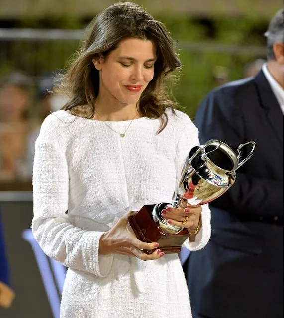 Charlotte Casiraghi of Monaco wore a white tweed top and tweed skirt from Cruise 2021 collection of Chanel