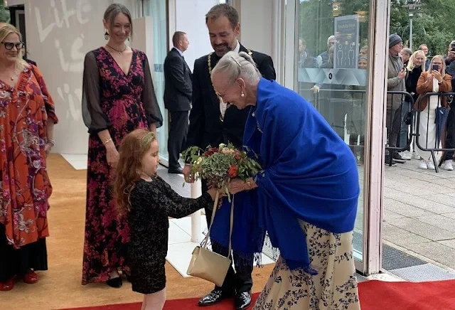 Aarhus Festival 2021 at Aarhus Concert Hall. Queen Margrethe wore a floral print dress gown. The Queen is patron of Aarhus Festival