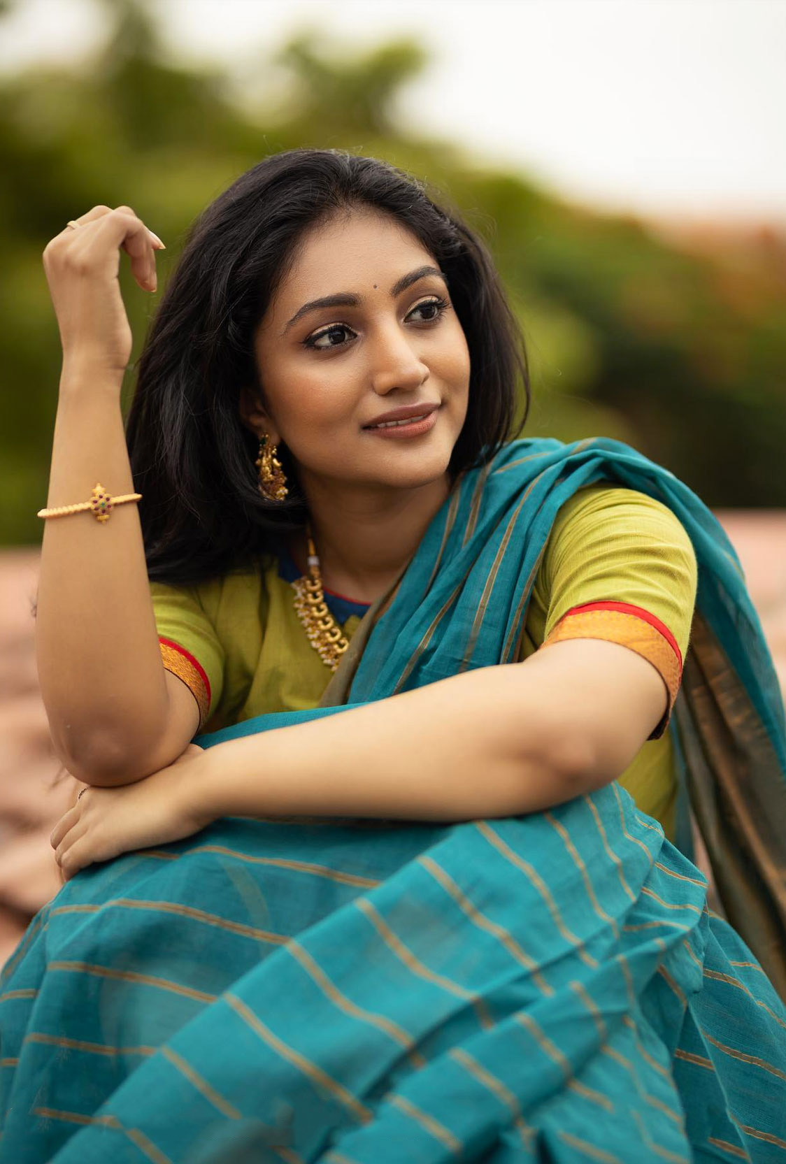 Bommu Lakshmi In green Saree Hot Photos