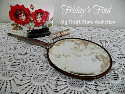 Friday's Find:  Estate Sale Vignettes  mythriftstoreaddiction.blogspot.com Vintage mirror, postcard and flower frog vignette