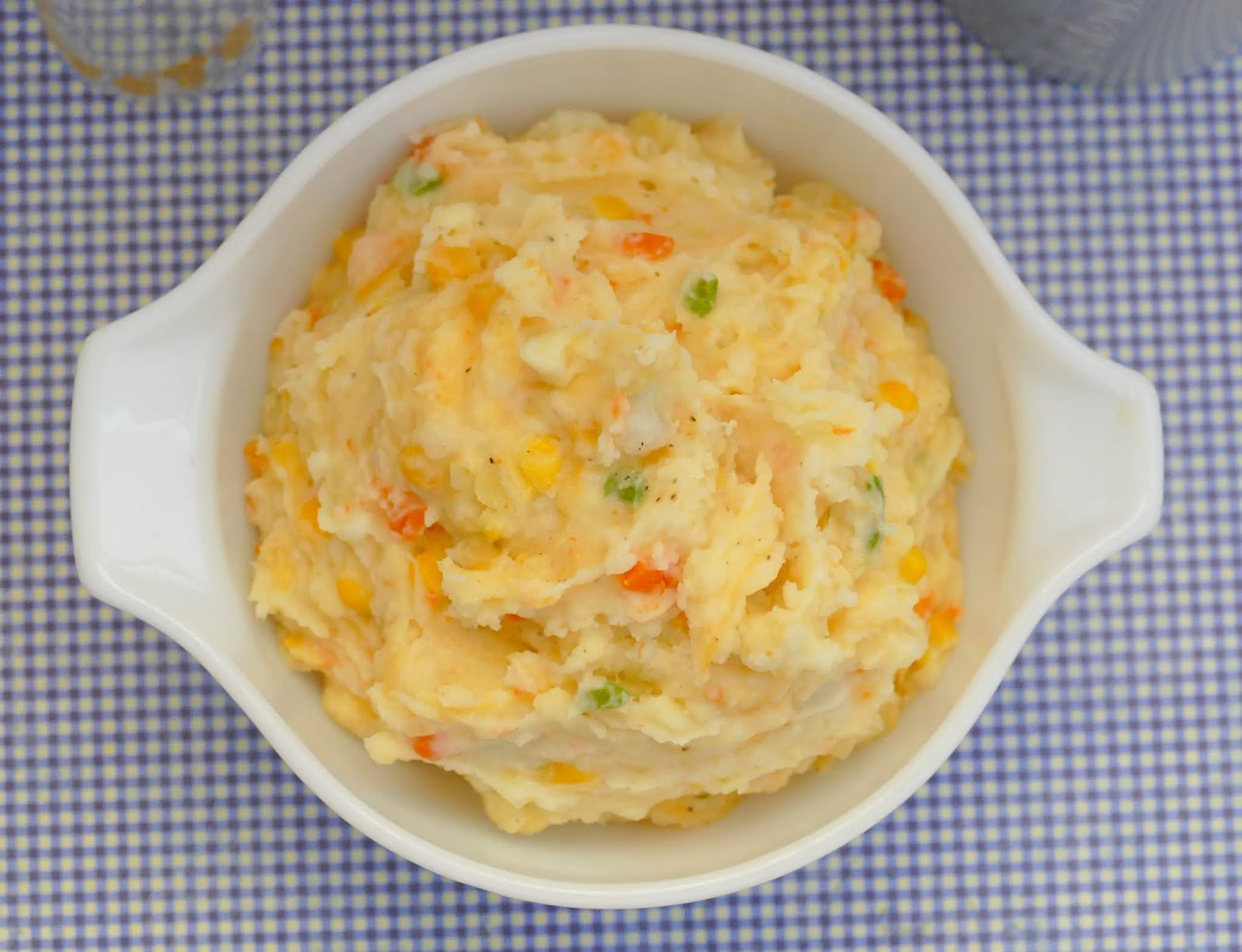 This unique and delicious side dish is perfect for weeknights, Sunday dinner, Thanksgiving, Christmas or Easter! The mixture of veggies and cheese inside the mashed potatoes makes it so flavorful. Total comfort food!