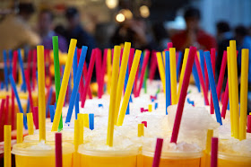 Juice with colorful straws at Sant Josep Market or La Boqueria Marquet in Barcelona