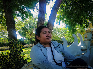 Woman Traveler Enjoy A Holiday Under The Tree In The Warmth Garden Atmosphere In The Morning At Tangguwisia Village North Bali Indonesia