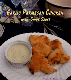 Garlic Parmesan Chicken with Chive Sauce are marinated, crusted chicken breast pieces baked and served with a creamy chive sauce. | Recipe developed by www.BakingInATornado.com | #recipe #dinner