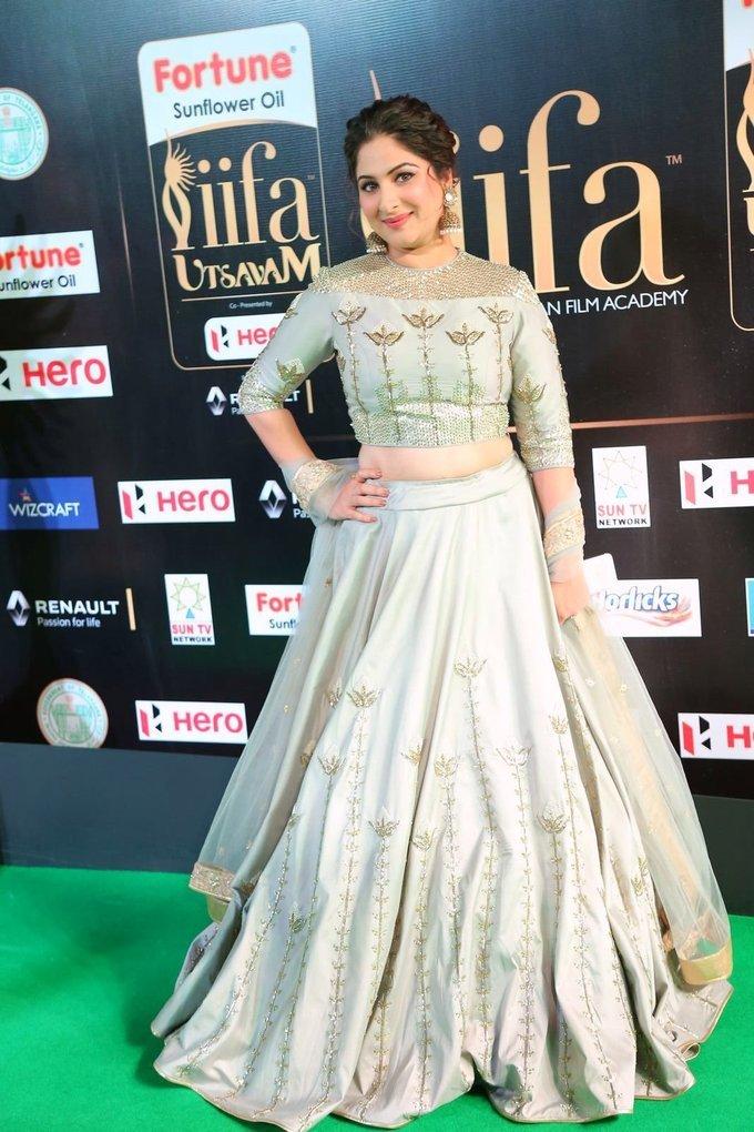 Gowri Munjal Hot Stills In Green Dress At Tsr Tv9 Film Awards