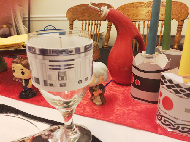 Enjoy a delicious dinner before going to see the new Star Wars movie while enjoying a fun Star Wars dinner party with your family and friends.  With these great party food ideas, party decorations, and awesome Light saber candlesticks, you will be on the winning side no matter what happens on screen.