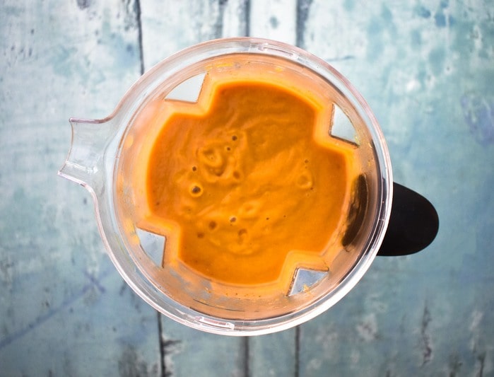 Smooth butternut squash soup in a blender jug