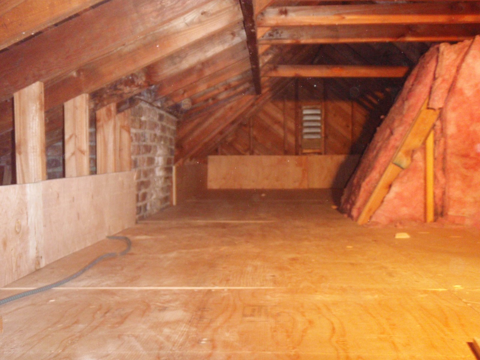 Home Pride Contracting Installing plywood in an attic