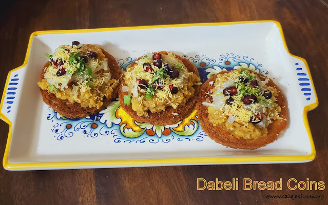 images of Dabeli Bread Coins / Dabeli Topping On Fried Bread Bites / Dabeli Bites / Dabeli Bread Bites