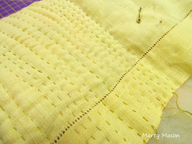 Big stitch hand quilting on linen tablecloth ~ Marty Mason