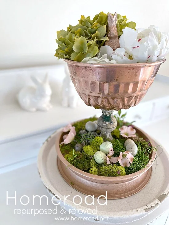 Easter tiered tray with moss and faux flowers and overlay