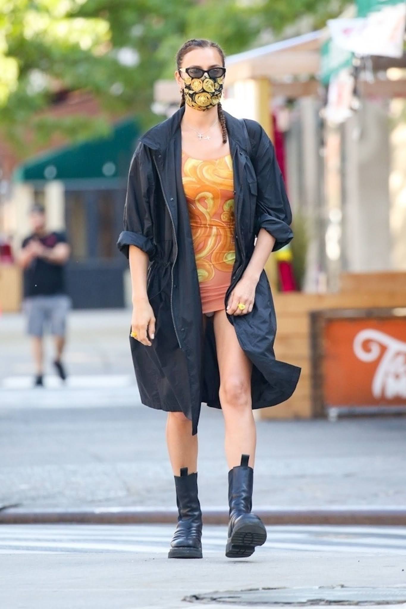 Irina Shayk wearing a tight short dress while out for a morning walk in New York