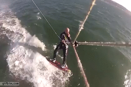 kite-surfer-jumps-over-whale.gif