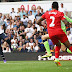 Danny Rose of Tottenham Hotspur scores the equaliser as the goal goes past Simon Mignolet of Liverpool during the Premier League match