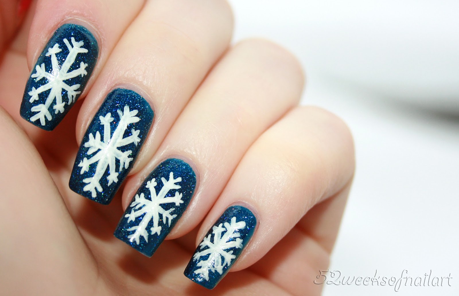 52weeksofnailart: Nail art: sparkly snowflakes
