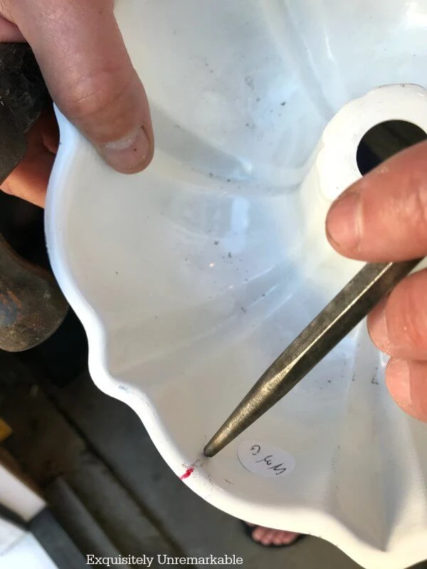 Using a metal punch on white cake pan