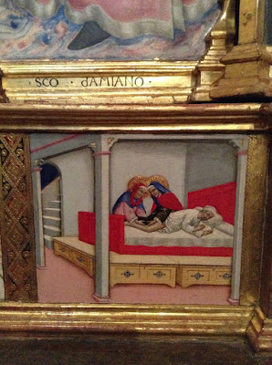 Pinacoteca di Siena: Sano di Pietro particolare della predella della Madonna col Bambino: i santi Cosma e Damiano attaccano la gamba ad un morte etiope ad un bianco