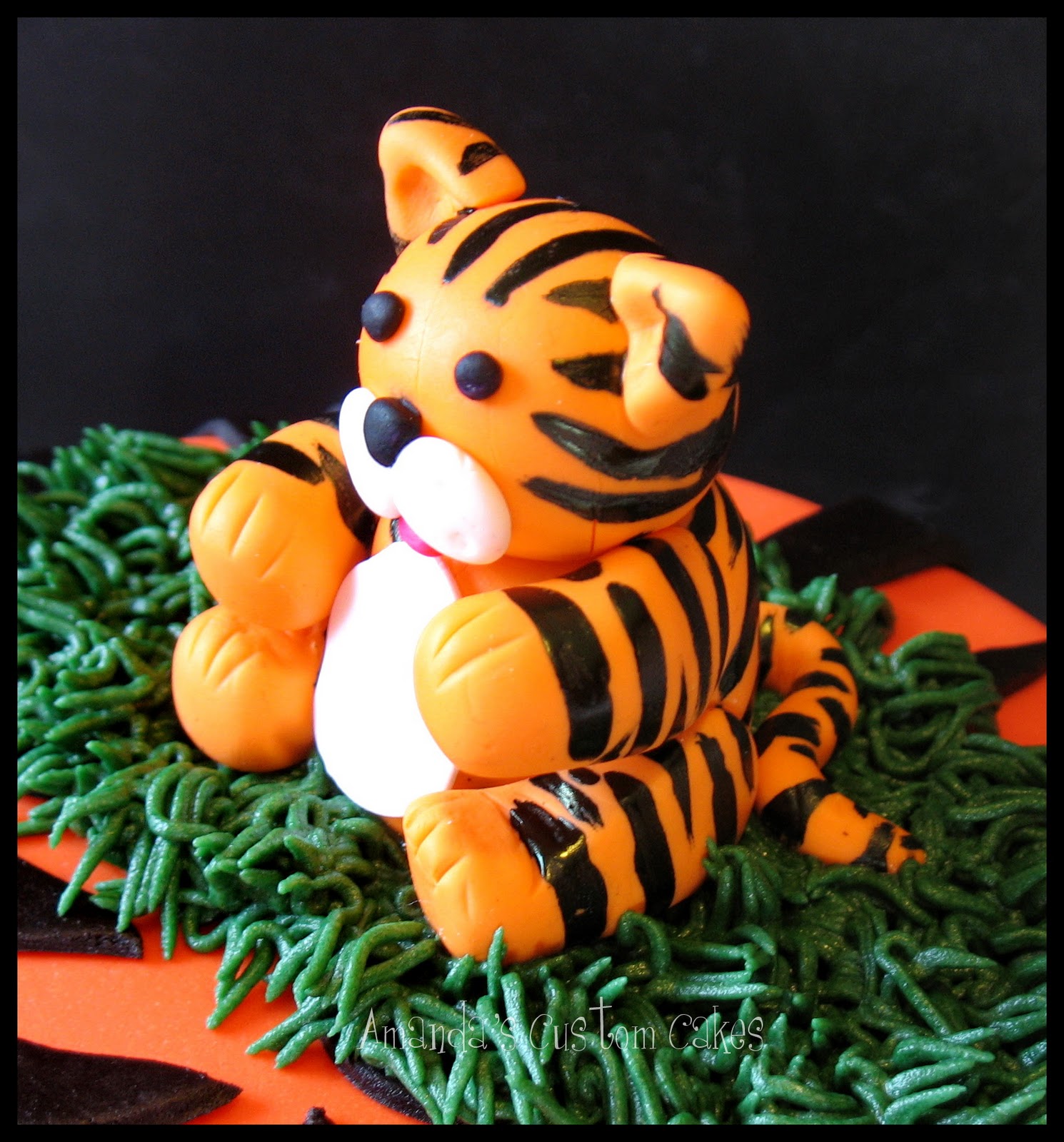 Amanda's Custom Cakes Tiger themed cookies and cake